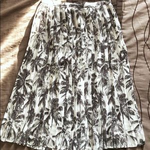 Black and white tropical pleated midi skirt